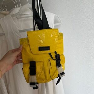 Kendall & Kylie Mini Yellow Backpack with Glossy Finish and Black Straps